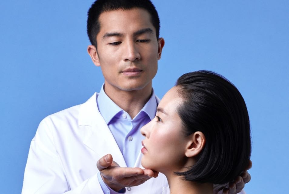 scientist testing La Roche-Posay skincare products in a laboratory, emphasizing the brand's science-backed approach to dermatology.